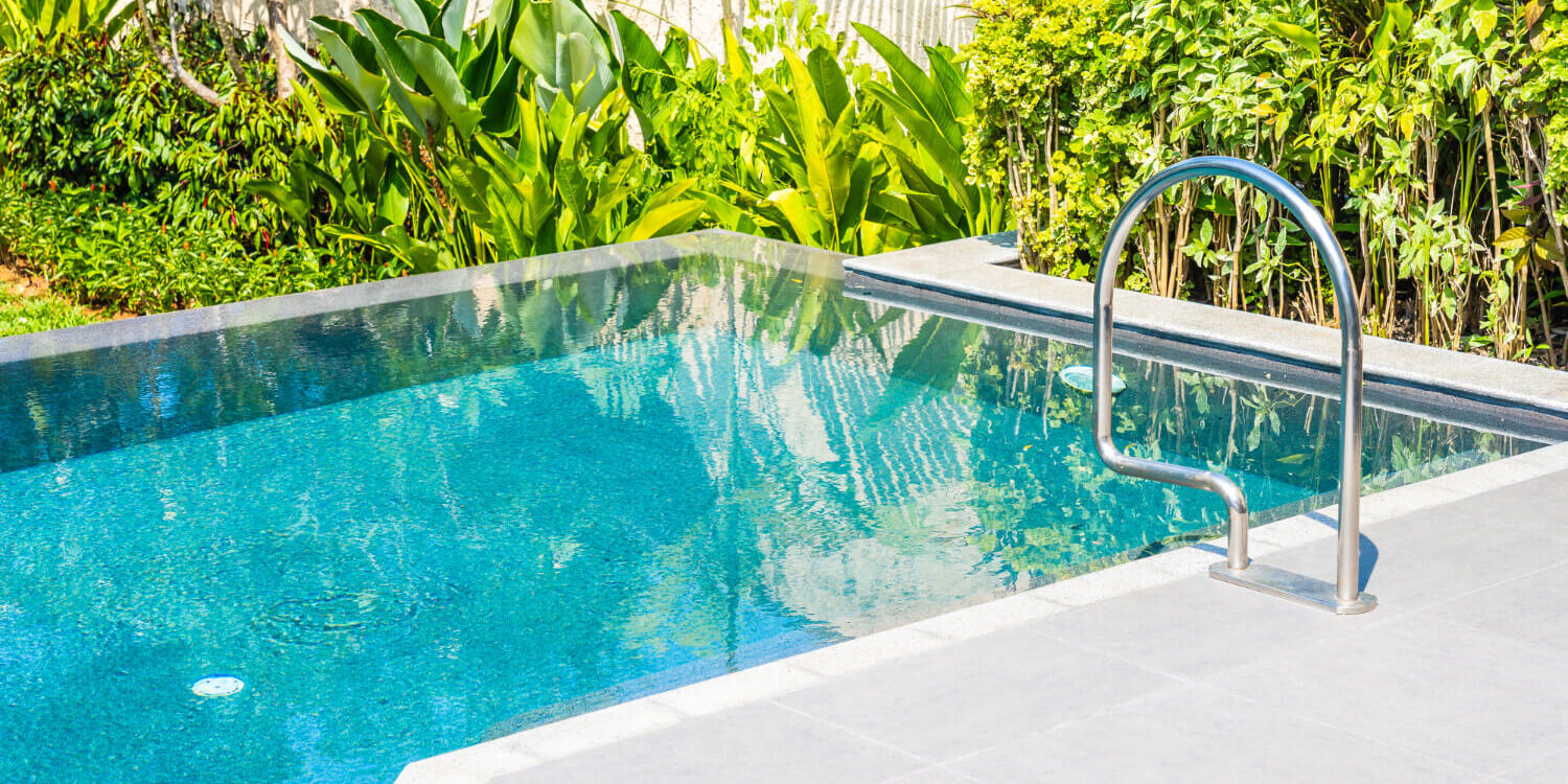 beautiful-landscape-outdoor-swimming-pool-in-hotel-and-resort-for-leisure