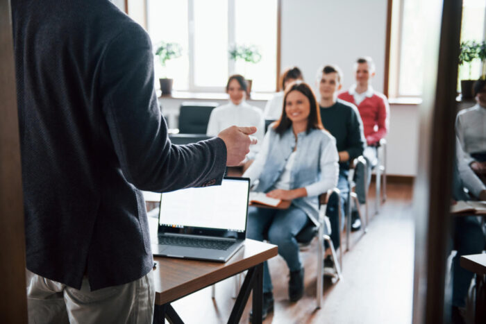 cheerful-mood-group-of-people-at-business-conference-in-modern-classroom-at-daytime
