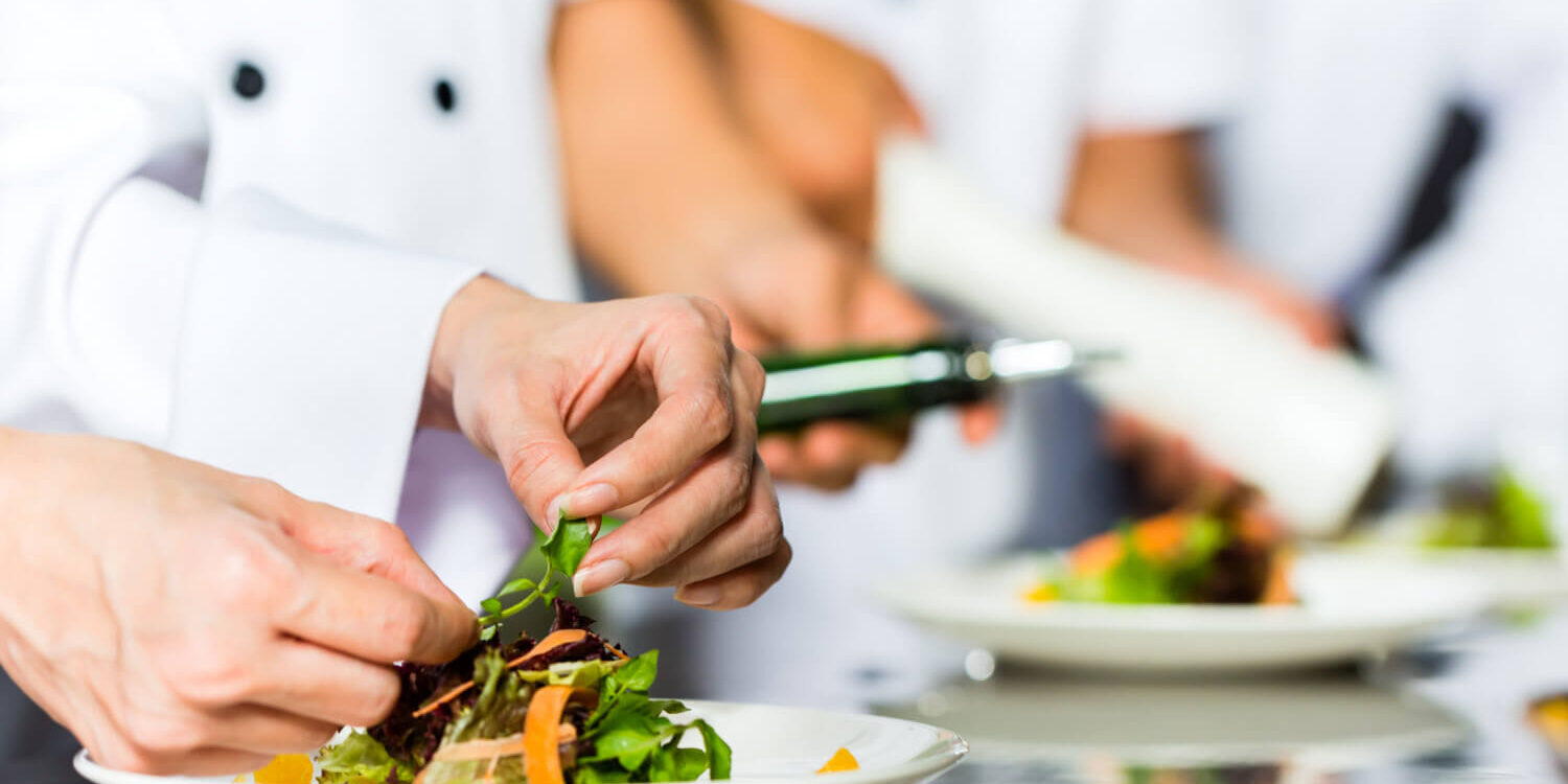 chef-in-restaurant-kitchen-cooking