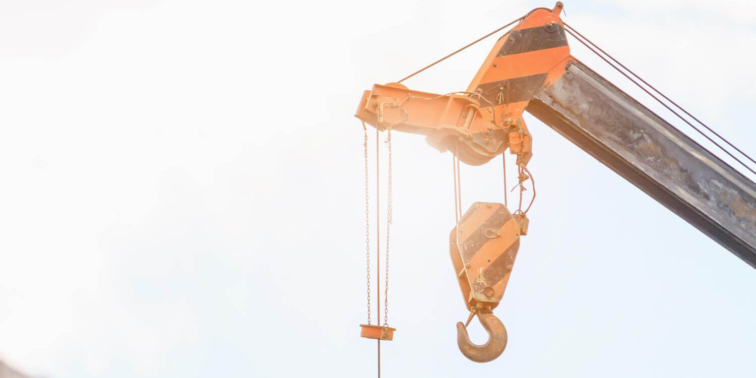 telescopic-arms-of-mobile-construction-crane-truck-at-building-site