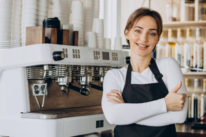 woman-barista-at-a-coffee-shop-preparing-coffee