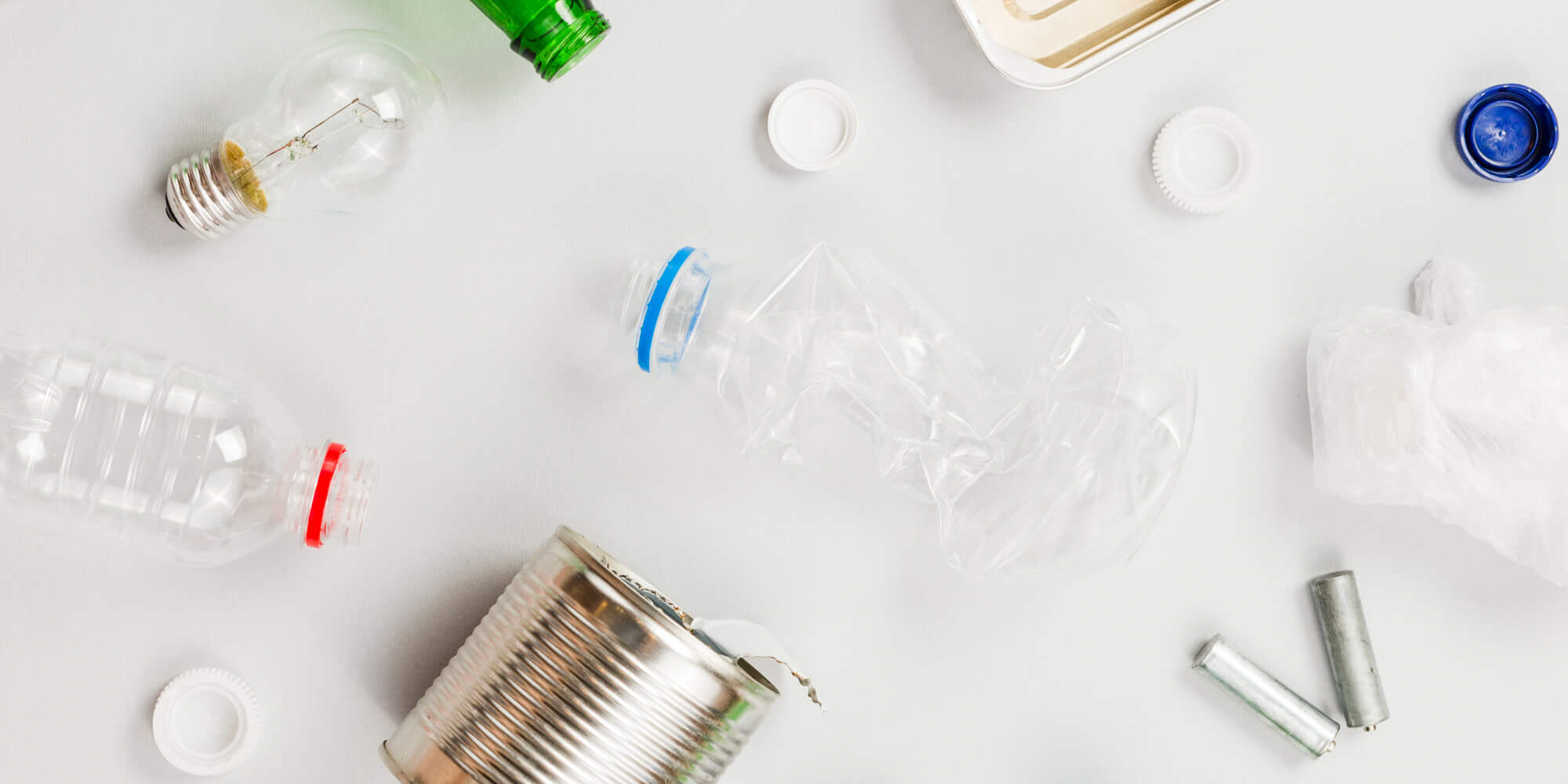 recyclable-trash-scattering-on-grey-table