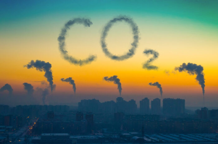 evening-view-industrial-landscape-city-with-smoke-emissions-from-chimneys-sunset-inscription-co2 (1)